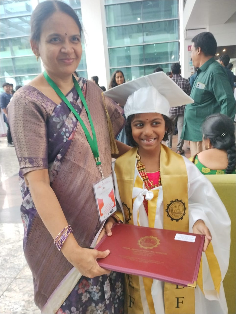 With Student at Graduation Ceremony